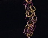 Hanging Bells Bracelet in Yellow, Purple, and Lavender