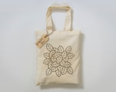 Small cotton tote bag with hand drawn leaf pattern design in black
