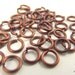 1/2 oz Brown Anodized Aluminum Jump Rings, Machine Cut, 18 ga 3/16