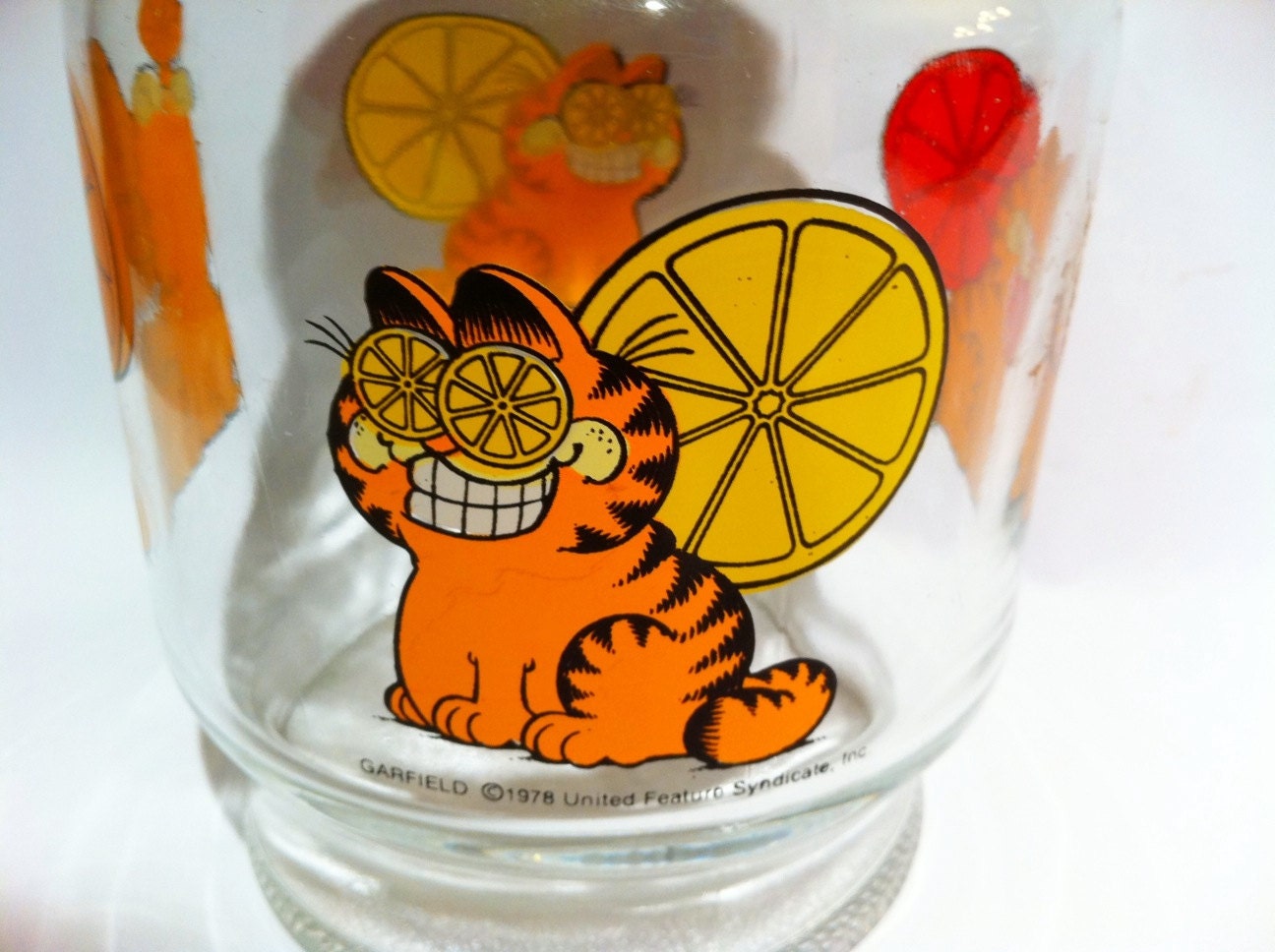 Vintage Garfield glass carafe juice pitcher with lid.