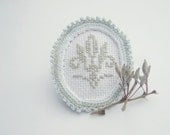 For her, textile jewelry, hand embroidery and crochet brooch, white, blue, gray, cross stitch motif - wincsike