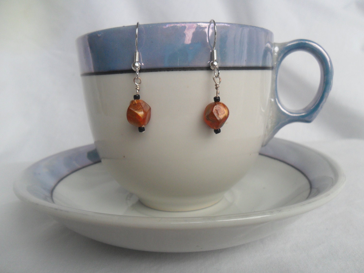 Dangling Bead Earrings, Black and Bronzy Orange Beads