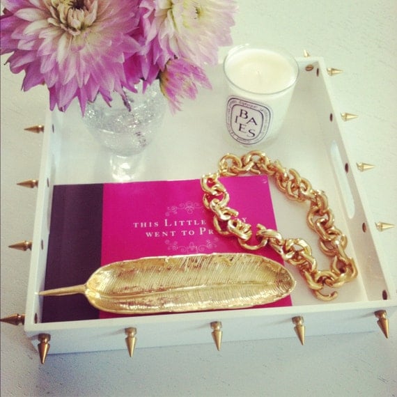 White tray with gold spikes