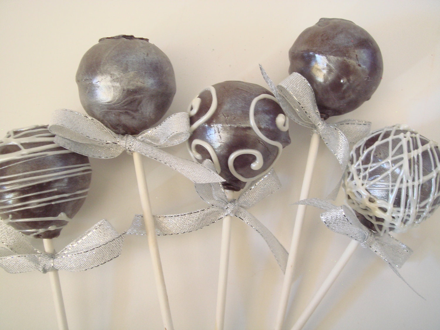 Fancy pearl chocolate covered cake pops for weddings bridal showers anniversary Valentine's Day