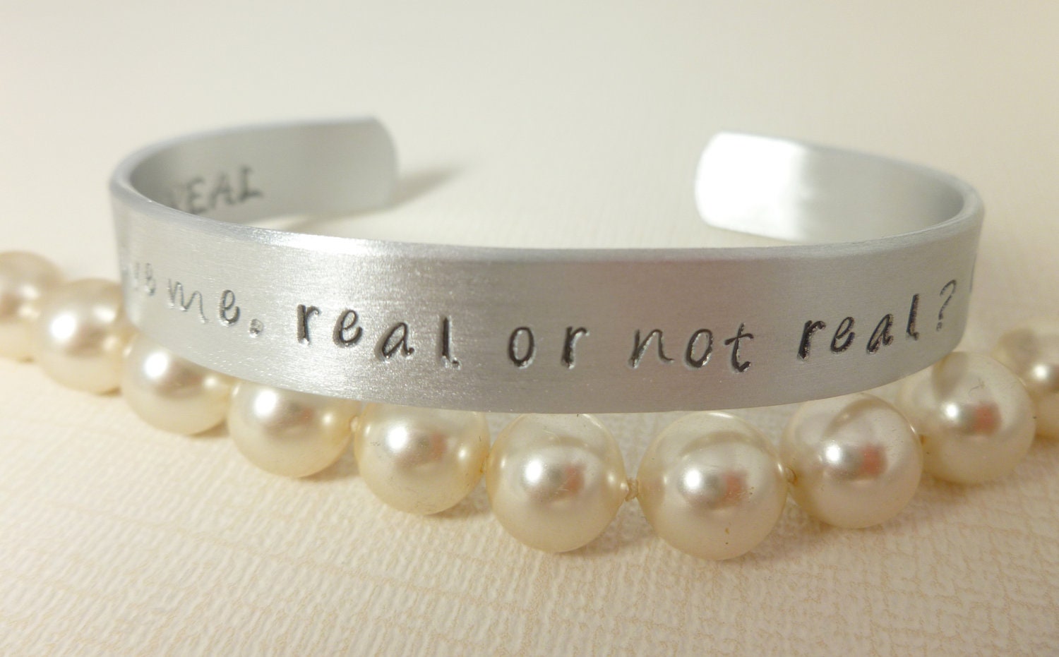 Hunger Games Inspired cuff bracelet ,Hand stamped Hunger Games cuff bracelet - Real or not real, REAL