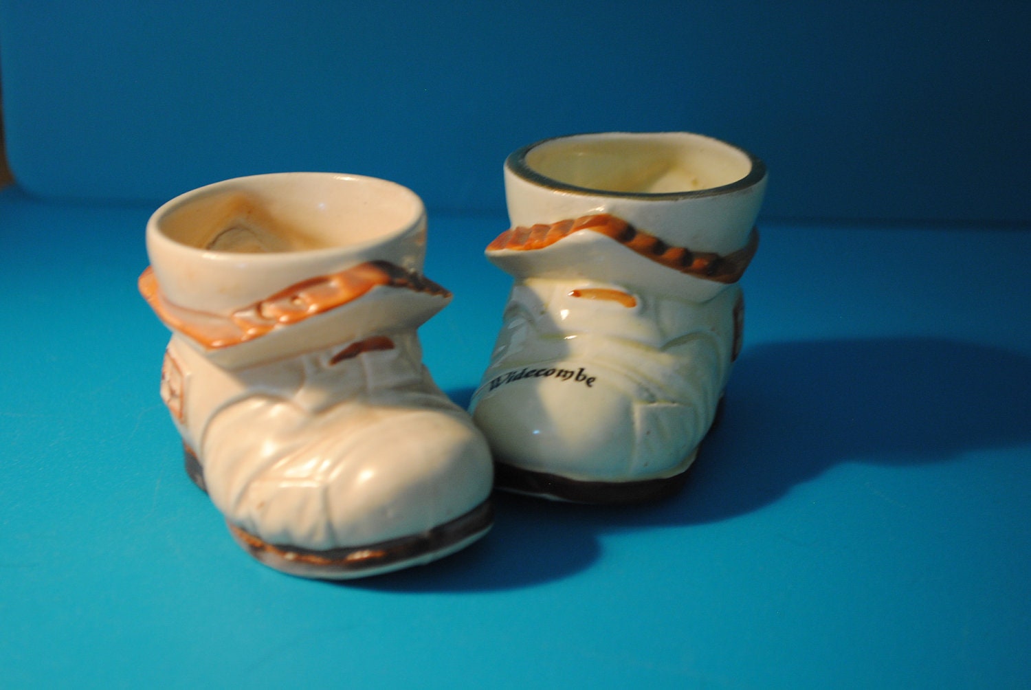 there was an old woman who lived in a shoe She had so many children, she didn't know what to do. egg cups