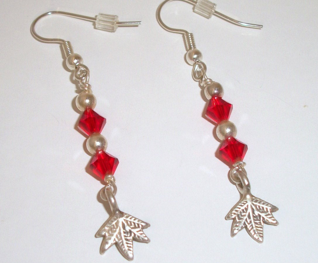 red crystal earrings with silver leafs, dangle leaf earrings