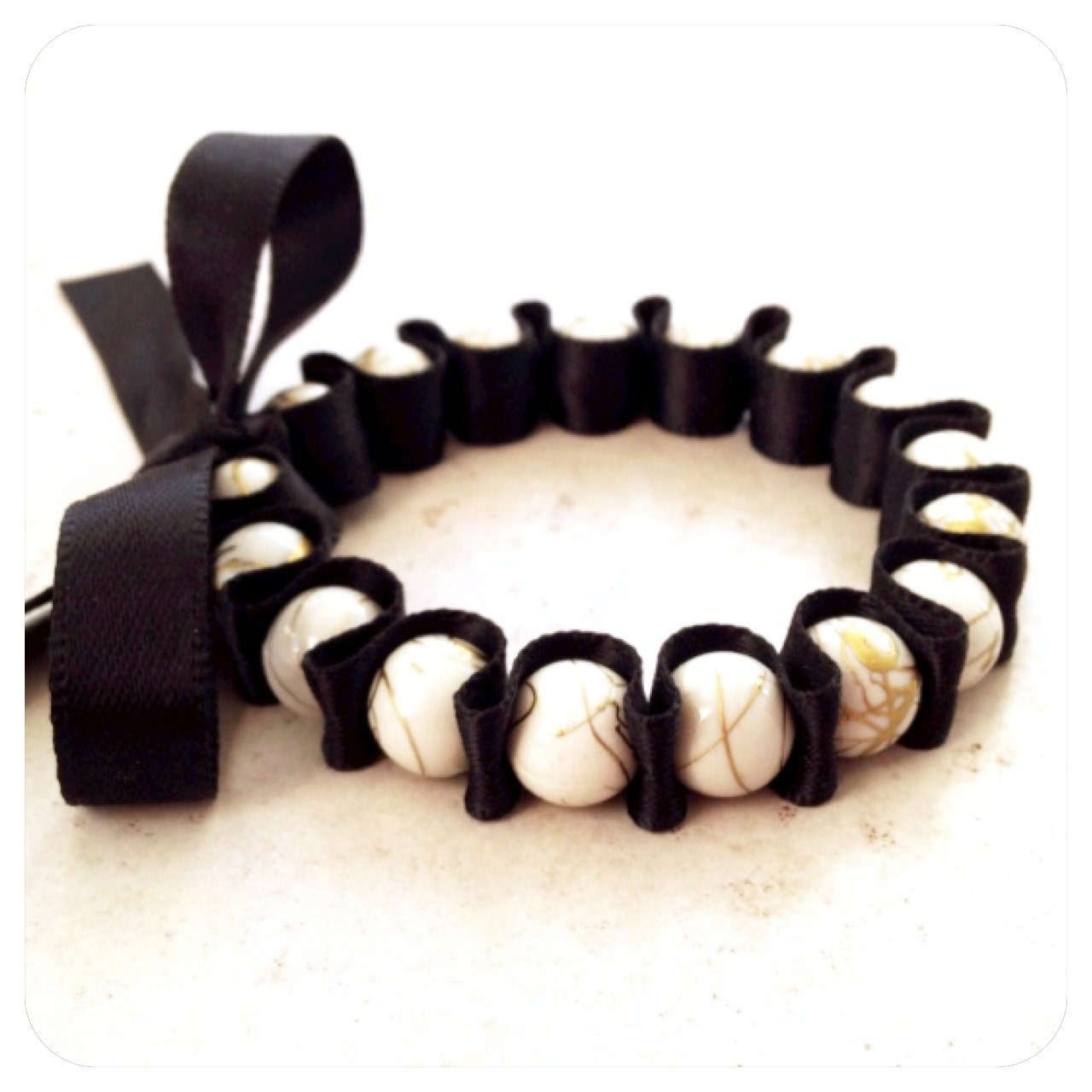 Black Ribbon and Gold Drizzled White Beaded Bracelet