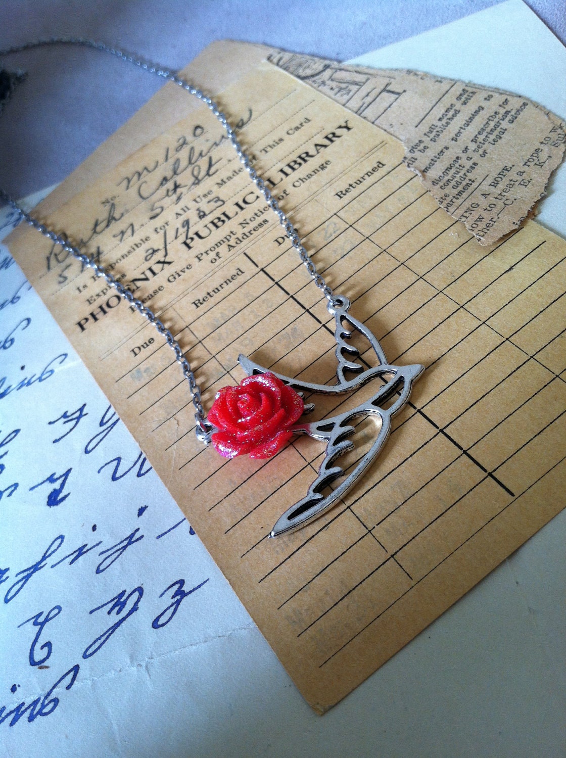 Filigree swallow with a red glitter rose cabochon, bird necklace