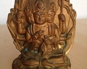 Highly collectible Japanese Buddhist 3 headed diety vintage molded metal figure