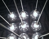 Custom Industrial Chandelier with Modern Glass Pendants in satin nickel sockets hung from gray rayon cord attached to premium cedar base