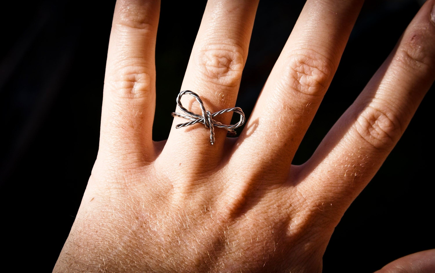 1 Metal ring that looks like a ribbon around your finger - totally handmade