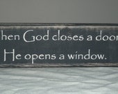 when god closes a door he opens a window primitive wood block sitter