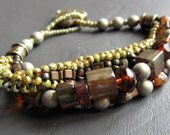 3 strand Boho bracelet with furnace glass and twisted herringbone in picasso finishes. Free shipping within Canada