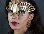 Bird mask in gold leather