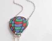 red, green and blue striped hot air balloon necklace