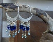 MOONDROPS. Rhodium plated crescent moons, cobalt blue crystal teardops and baby blue crystals