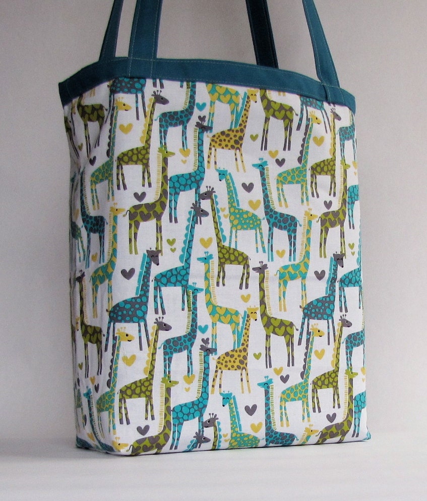 love giraffes on teal reversible shoulder bag with pocket