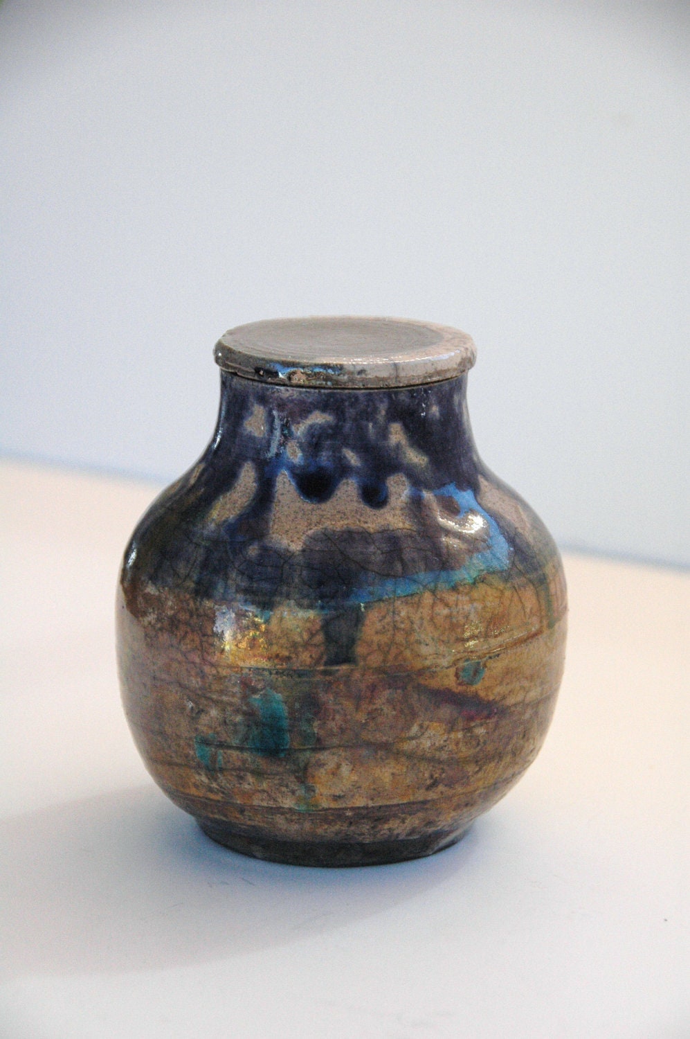 Raku Fired Lided Jar  --  Blue Denim, Gold, Copper and Turquoise