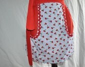Womens half apron in red cherries on blue gingham, with large pocket.  Ready to ship.