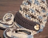 Crocheted little boy hat and shoe set