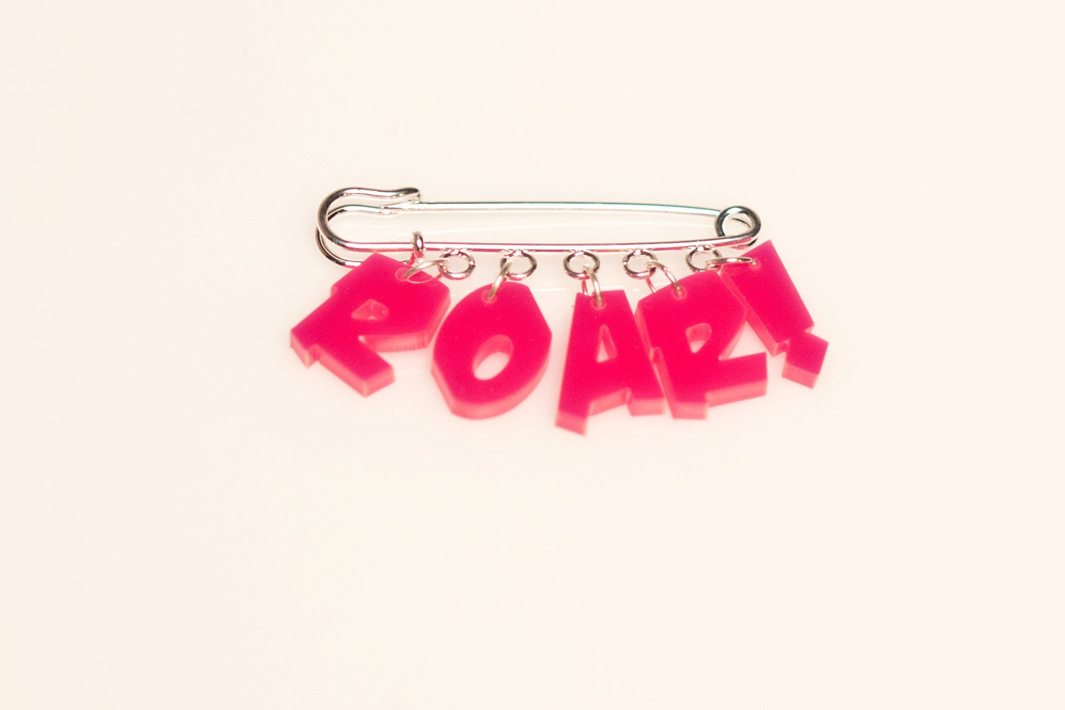 ROAR Brooch in Acrylic on large Safety Pin style badge. Dinosaur ROAR in Perspex on Kilt Pin