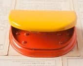 Vintage Yellow and Orange Metal Two-Hole Puncher