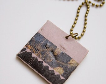 Handmade stoneware necklace. Floating leaves pendant.
