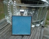 Pale Paisleys on Baby Blue Silver Finished Pendant