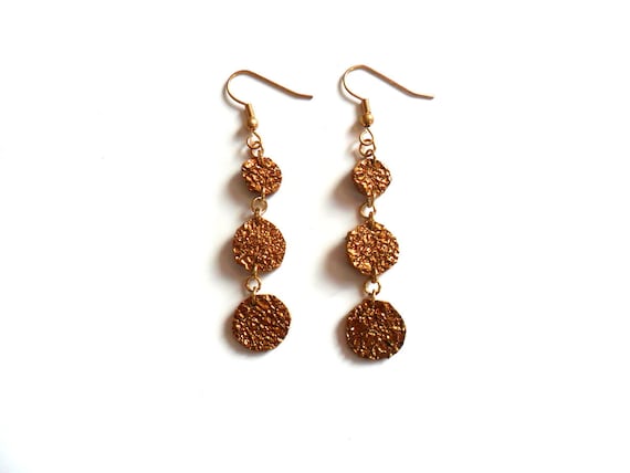 Metallic bronze bubbles leather earrings