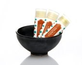 Royal Tea glossy lip balm tube.  Earl Grey Tea lip balm. Pumpkin orange. Theme Fragrance - . ..   Gift