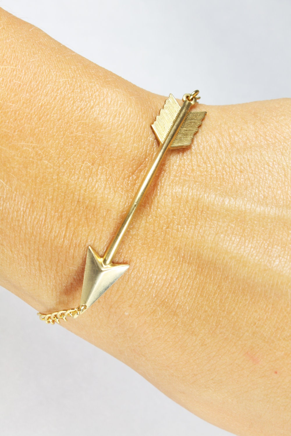 Items similar to GOLD Arrow BRACELET on Etsy