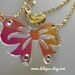 Radiant bow laser cut with four clear swarovski