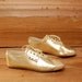 size 9.5 LA GEAR metallic leather 80s GOLD lace up tennis shoes