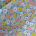 Vintage 1970s Era Flower Power Fabric Gray Background Yellow Tangerine PInk and White Floral