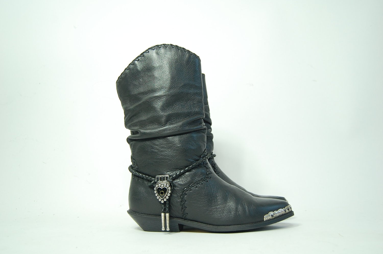 Items similar to vintage ZODIAC BLACK BOOTS slouch tassel leather