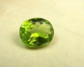 Peridot Gemstone - all natural unheated untreated gem - Pakistan - faceted gemstone - oval - 4 - 5  Carats - 12 mm  - AAA