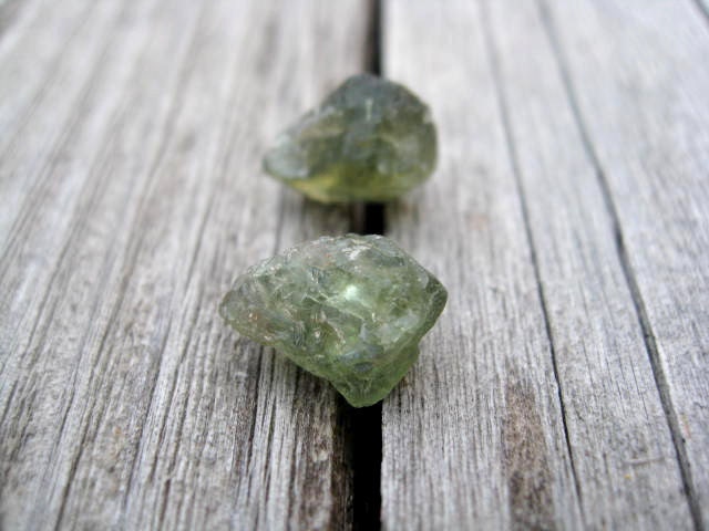 rough apatite earrings. raw gemstone studs. sterling silver earrings in green apatite. splurge.