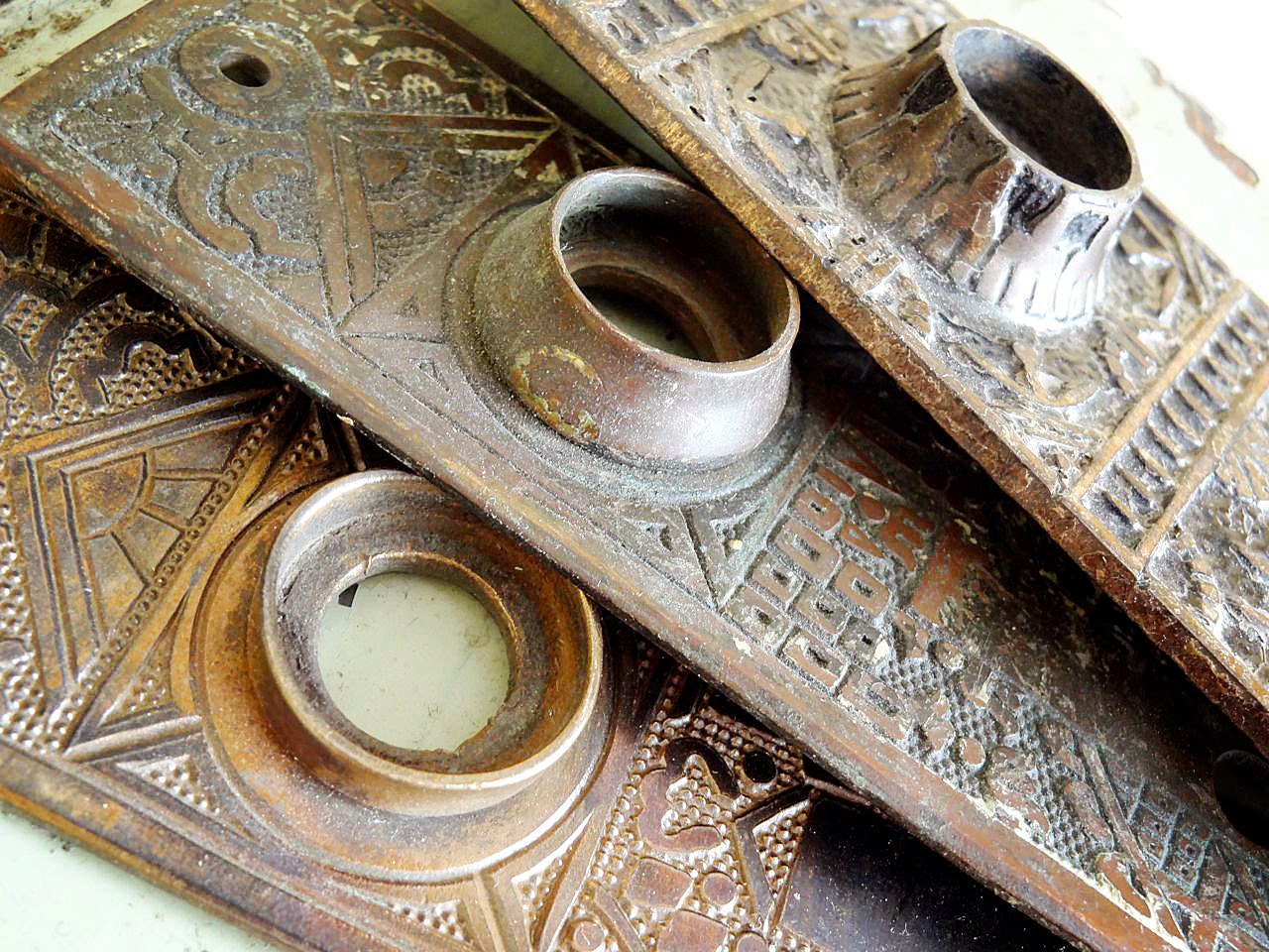 vintage brass door plate or escutcheon, art deco style, brass with patina (2)
