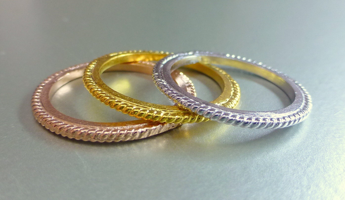 Gold stacking rings. 14k gold.  textured bands.