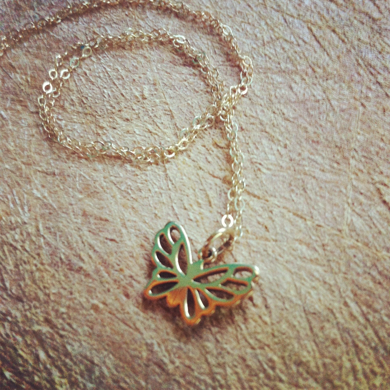 Tiny Butterfly Necklace in Gold