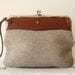 etienne aignier woven wristlet bag . leather & linen