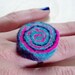 Swirly felt ring 'Sugar spice and everything nice'