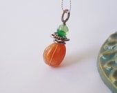 Carnelian and Emerald green agate wire wrapped pendant accented with antique silver color metal rings: Pendant only
