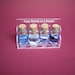 Four kinds of sea animals are in a tiny bottle in a small cute case
