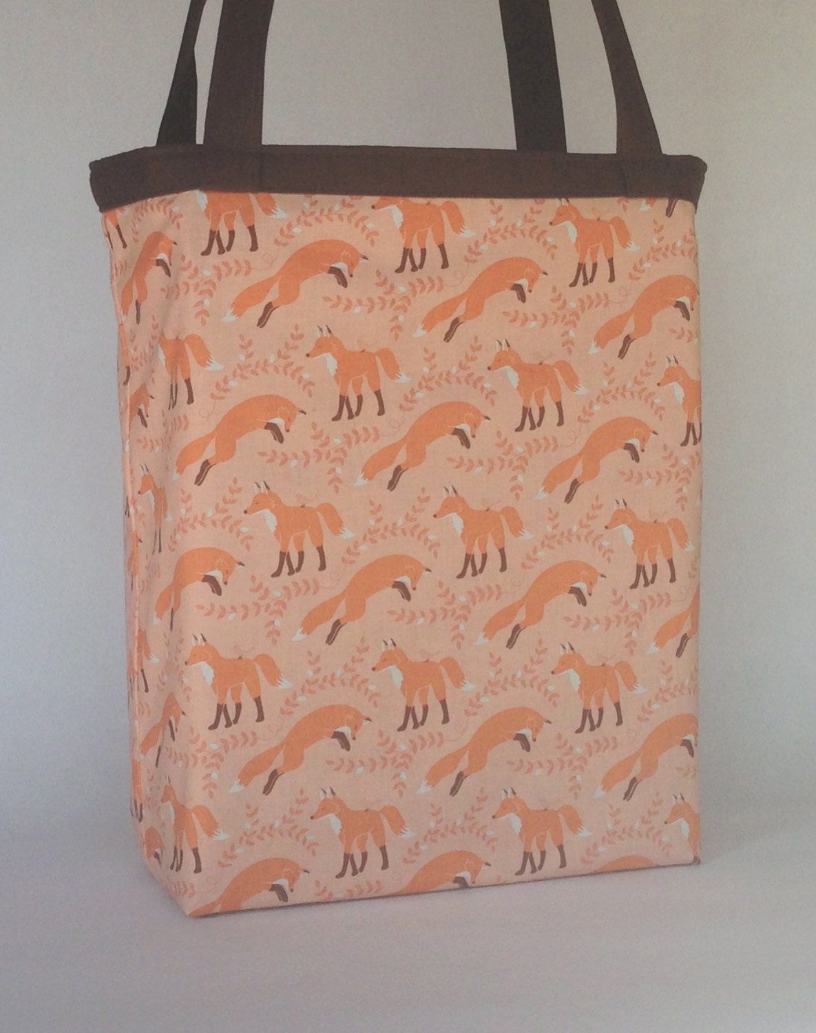 orange foxes and birds reversible shoulder bag with pocket