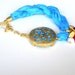 Turquoise silk bracelet with pink jade ,pearl and gold plated metal