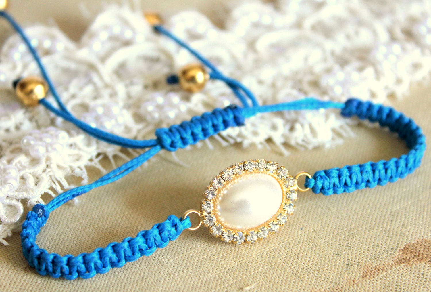 Blue Friendship bracelet braded with pearls and swarovski rhinestones