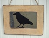RAVEN Silhouette Antiqued Mirror in Latte Colored Rustic Frame