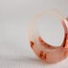 pale rose copper size 8 multifaceted eco resin ring with suspended copper flakes